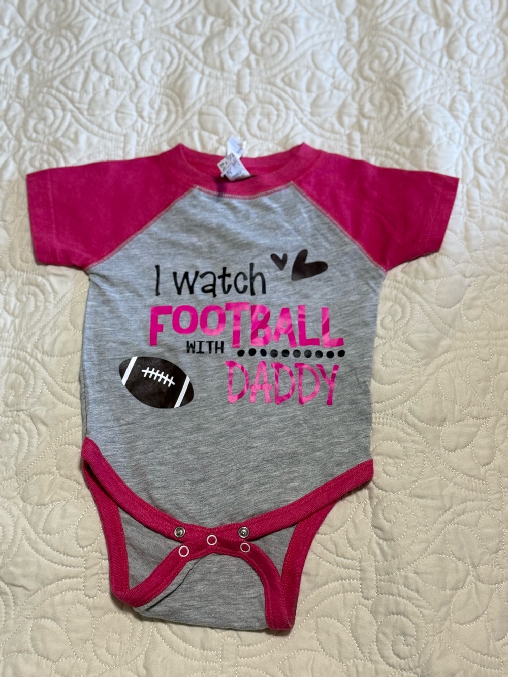 Hot Pink and Gray Football themed onesie “I Watch Football With Daddy” baby